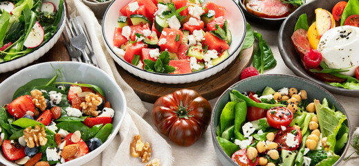 Different kinds of summer salads. Healthy lifestyle.