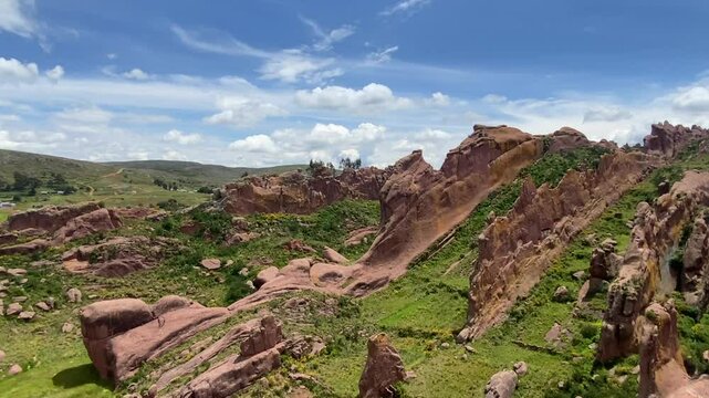 Reddish rock formations in Aramu Muru near Puno in Peru