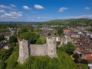 Beautiful aerial view to old historic medieval castle in green hill © Cavan