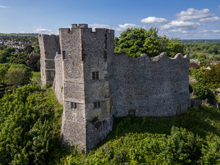 Beautiful aerial view to old historic medieval castle in green hill © Cavan