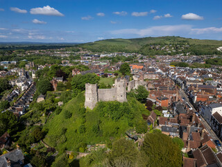 Fototapeta premium Beautiful aerial view to old historic medieval castle in green hill