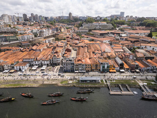 Beautiful aerial view to traditional boats and buildings by river