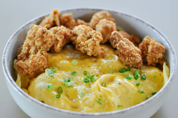 creamy omelet or omelet or omelette or fried egg with fried chicken or crispy chicken or chicken