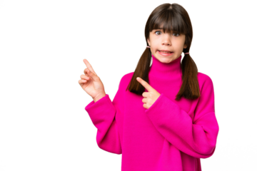 Little caucasian girl over isolated background frightened and pointing to the side