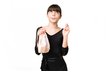 Little caucasian girl practicing ballet over isolated background with fingers crossing and wishing the best