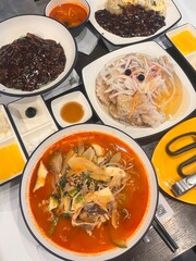 Spicy jjampong with seafood and noodles, savory jajangmyeon with rich black bean sauce, and crispy tangsuyuk in sweet and sour glaze. A perfect trio of bold flavors and satisfying textures.