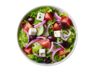 Fresh Greek salad with feta cheese, kalamata olives, tomatoes, red onion, and cucumber served in a white bowl is shown isolated against a white background.