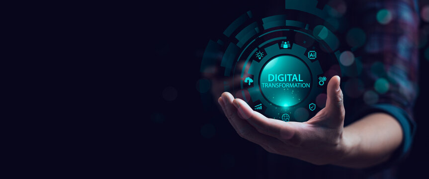 Hand holding glowing digital transformation icon with futuristic technology interface, AI chip, cloud computing, analytics and automation concept for innovation, smart business and digital strategy