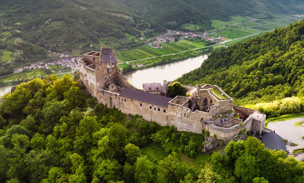 Austria - Burg Aggstein, Beautiful landscape with castle ruin and Danube River at sunset in Wachau valley Austria.
