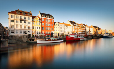 Nyhavn Pedestrian waterfront street: outdoor cafes & colorful buildings. Nyhavn (New Harbour) is XVII century waterfront, canal and entertainment district
