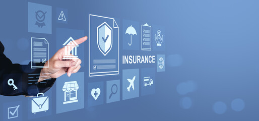 Businessman hand interacting with digital insurance icons on transparent screen representing modern financial protection concept on blue background.