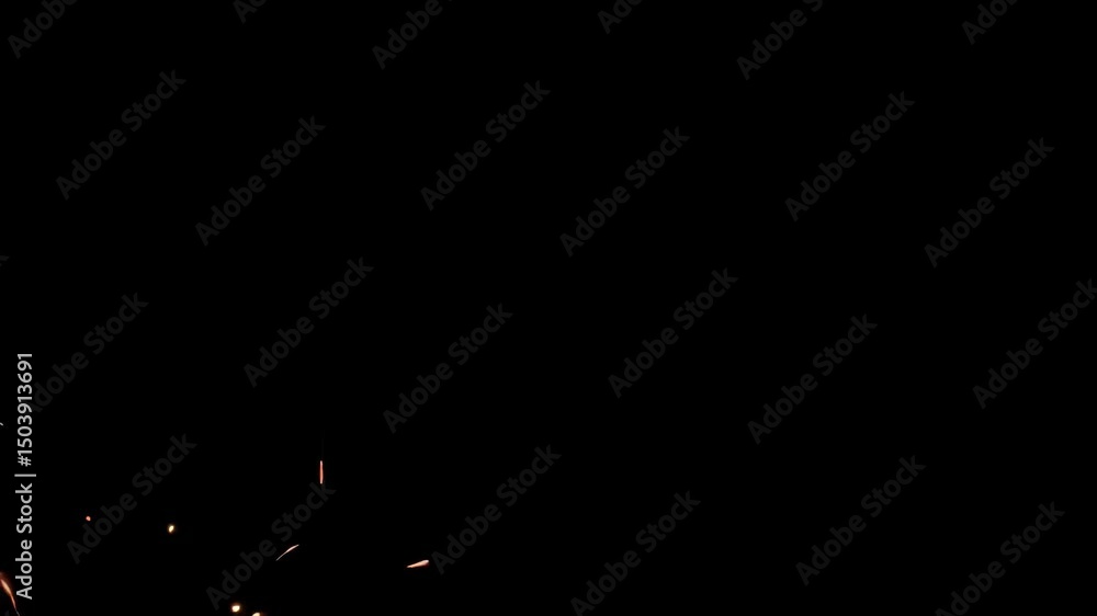 Aufkleber a burst of hot fiery light shooting upwards against a black backdrop with many glowing embers sparkl