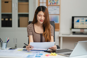 woman developer or designer thinking about mobile app interface wireframe design with customer...