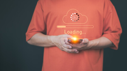 Adult man holding a smartphone with a glowing orange cloud upload icon and loading progress bar, representing cloud computing, data transfer, internet of things, and digital technology.