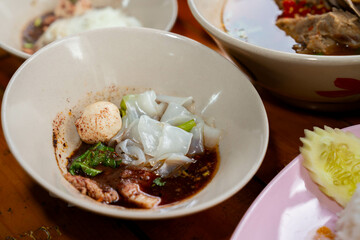 Thai Wide Noodle Pork Blood Soup (Guay Teow Nam Tok Sen Yai) © wattanachai