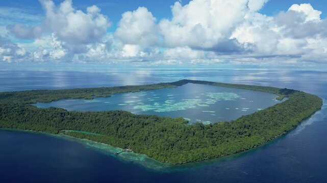 Kakaban, Indonesia: Panoramic aerial drone footage of the Kakaban island in the Derawan archipelago close to Maratua, a popular scuba diving spot, in Kalimantan, Indonesia Borneo. 