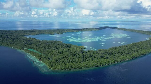 Kakaban, Indonesia: Panoramic aerial drone footage of the Kakaban island in the Derawan archipelago close to Maratua, a popular scuba diving spot, in Kalimantan, Indonesia Borneo. 