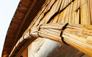 Bamboo curved wall structure background.