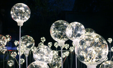Light ball illuminated at night background.