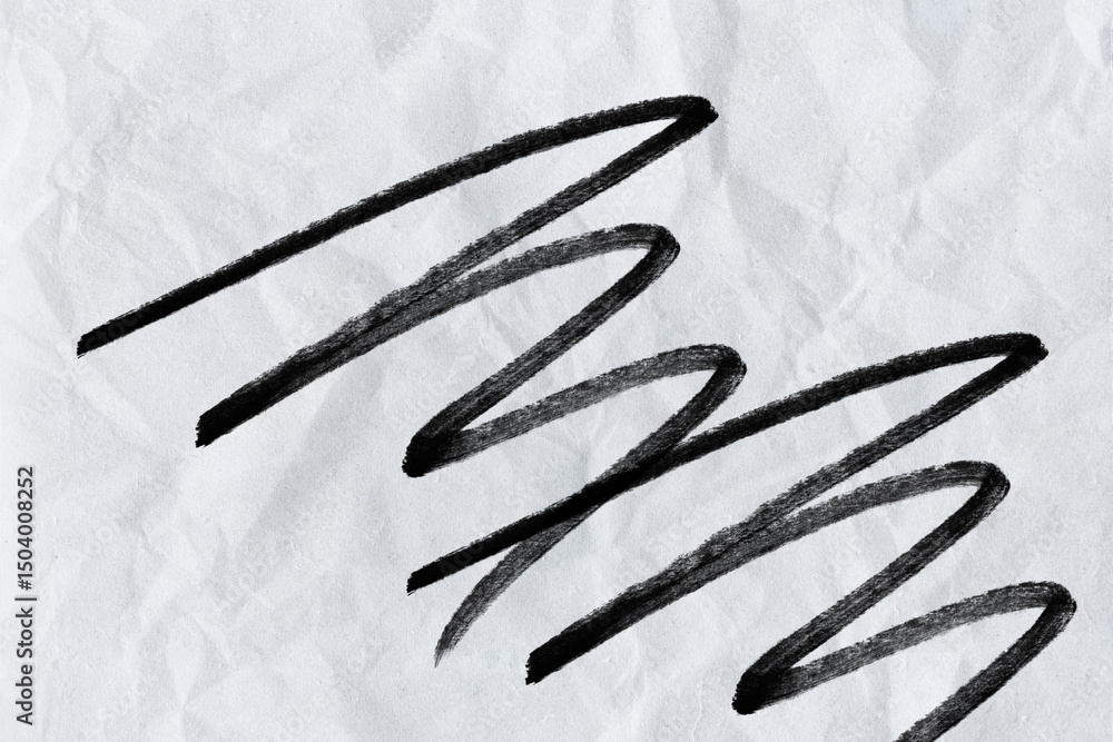 Aufkleber energetic black ink zigzag lines on textured white paper a striking visual element for creative proj