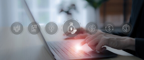 Budget and financial management concept. Business professional interacts the futuristic financial icons on virtual screen with budget planning, financial forecasting, efficient budget allocation.