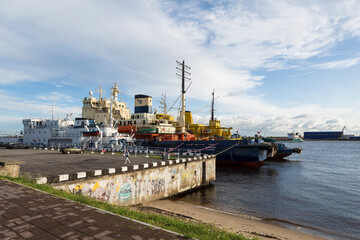 Icebreakers "Dixon", "Captain Chadaev" moored at the pier of the marine-river station. Arkhangelsk, Russia