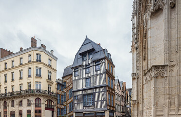 Half timbered houses at the Place Barthelemy in Rouen around the Saint Maclou church in the historic part of the city
