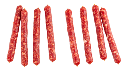 Cured meat sticks tumbling down isolated on transparent background
