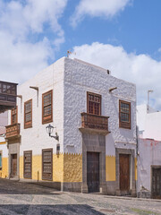 Traditional House Facade with Shutters and Cactus Garden in Las Palmas de Gran Canaria, Canary Islands