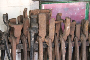 A Collection of Classic Tools in a Blacksmith Workshop.