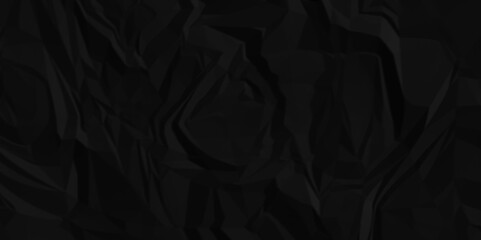Crumpled paper texture . Black wrinkled paper texture. Black crumpled and top view textures can be used for background of text or any contents .	
