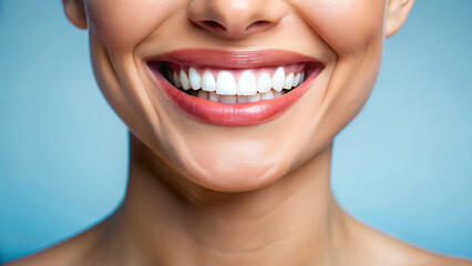A close-up of a smiling woman with perfect white teeth and glossy lips, against a soft blue background. The focus is on her mouth and teeth, showing a healthy, beautiful smile. High resolution, profes