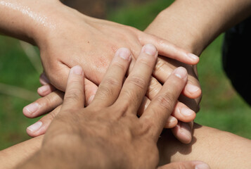 Unity and Collaboration Concept with Diverse Hands on Top of Each Other