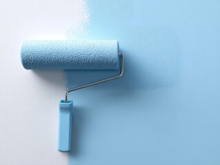Obraz premium A blue paint roller on a blue wall