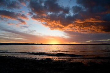 Dramatic Red Sunset Sky over Pt Chevalier Beach