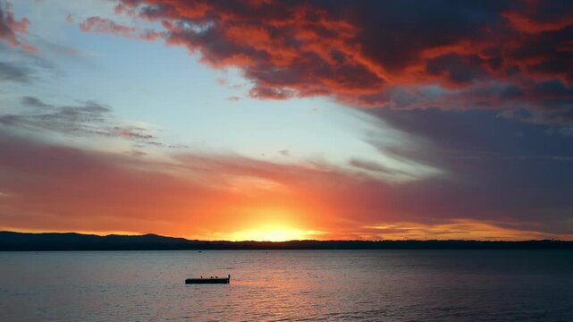 Dramatic Red Sunset Sky over Pt Chevalier Beach