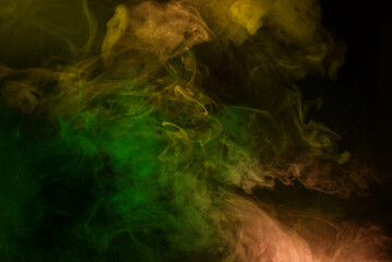 Yellow and pink steam on a black background.