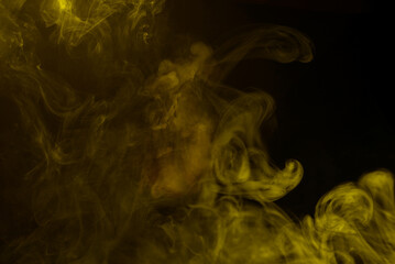 Yellow and pink steam on a black background.