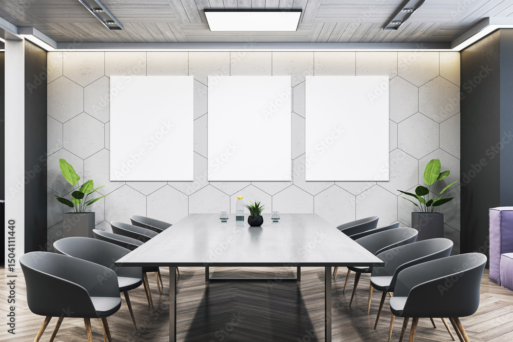 Poster modern conference room with sleek table and three vertical mockup posters on geometric wall in clean