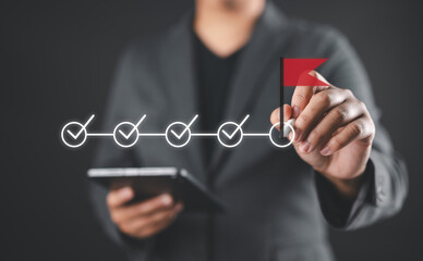 Businessman checking mark on checkbox for check completed tasks. Project tracking, Man using...