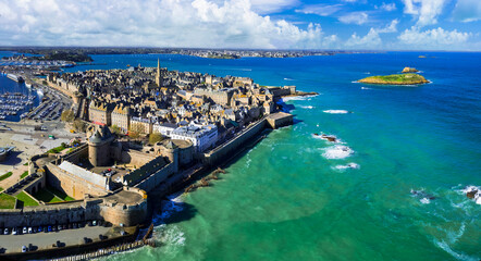 France travel and landmarks. aerial panoramic view of Saint -Malo , historic French port in Ille-et-Vilaine, Brittany. drone view of old city and harbour