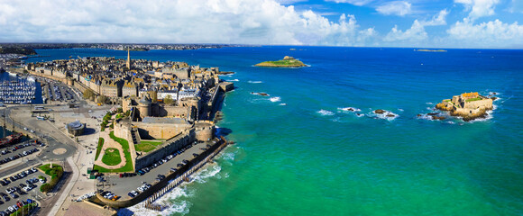 France travel and landmarks. aerial panoramic view of Saint -Malo , historic French port in Ille-et-Vilaine, Brittany. drone view of old city and national fort on the island