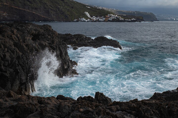 waves crashing on rocks