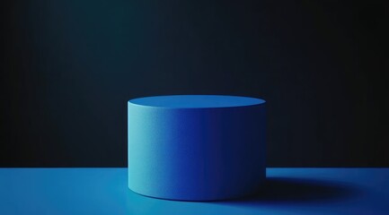 Cobalt cylinder podium on a blue surface
