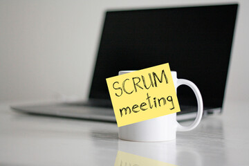 Scrum meeting for process software development is shown as business concept