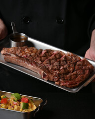 Perfectly Grilled Ribeye Steak Served on a Tray