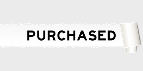 Ripped gray paper background that have word purchased under torn part