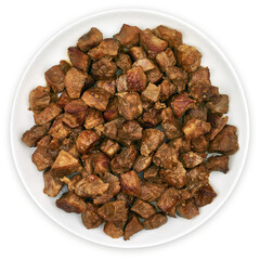 Top view of a plate filled with cooked, cubed beef pieces isolated on a transparent background. Delicious roasted meat ready to serve for dinner. PNG.