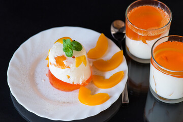 Light milk dessert with bright layers of jelly