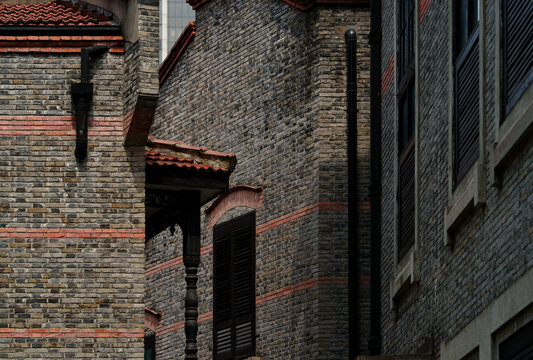 old brick wall with windows